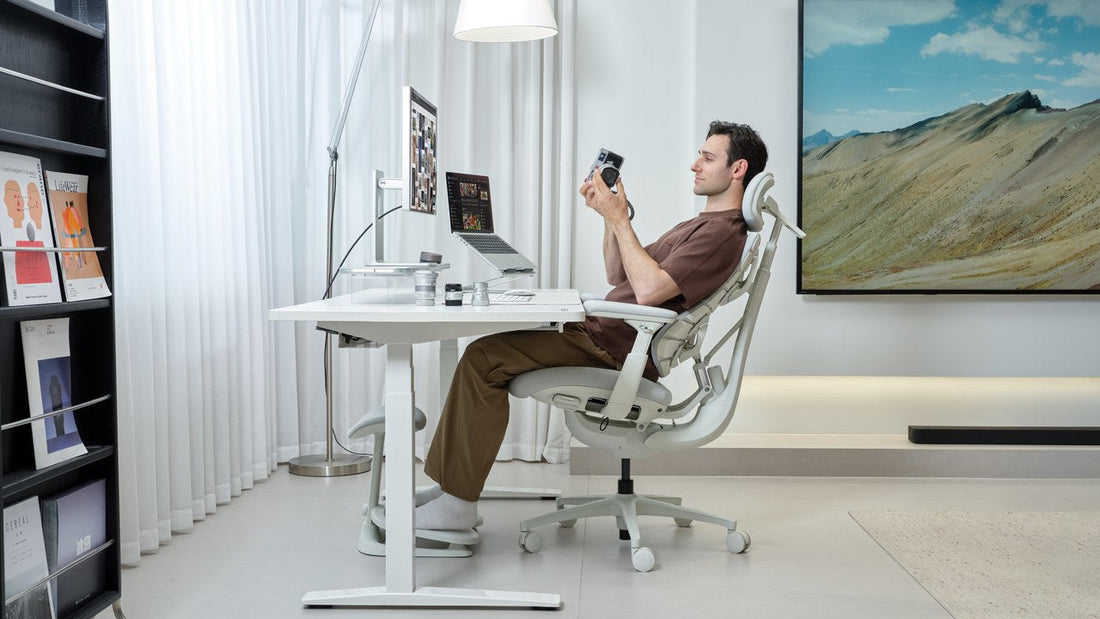 Healthy sitting posture in a supported reclined position at a desk
